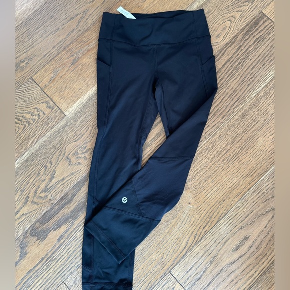 lululemon athletica Pants - Lululemon black womens athletic leggings pockets  cropped 23” size 2